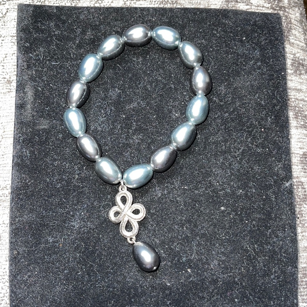 Gray pearl style bracelet with silver drop.